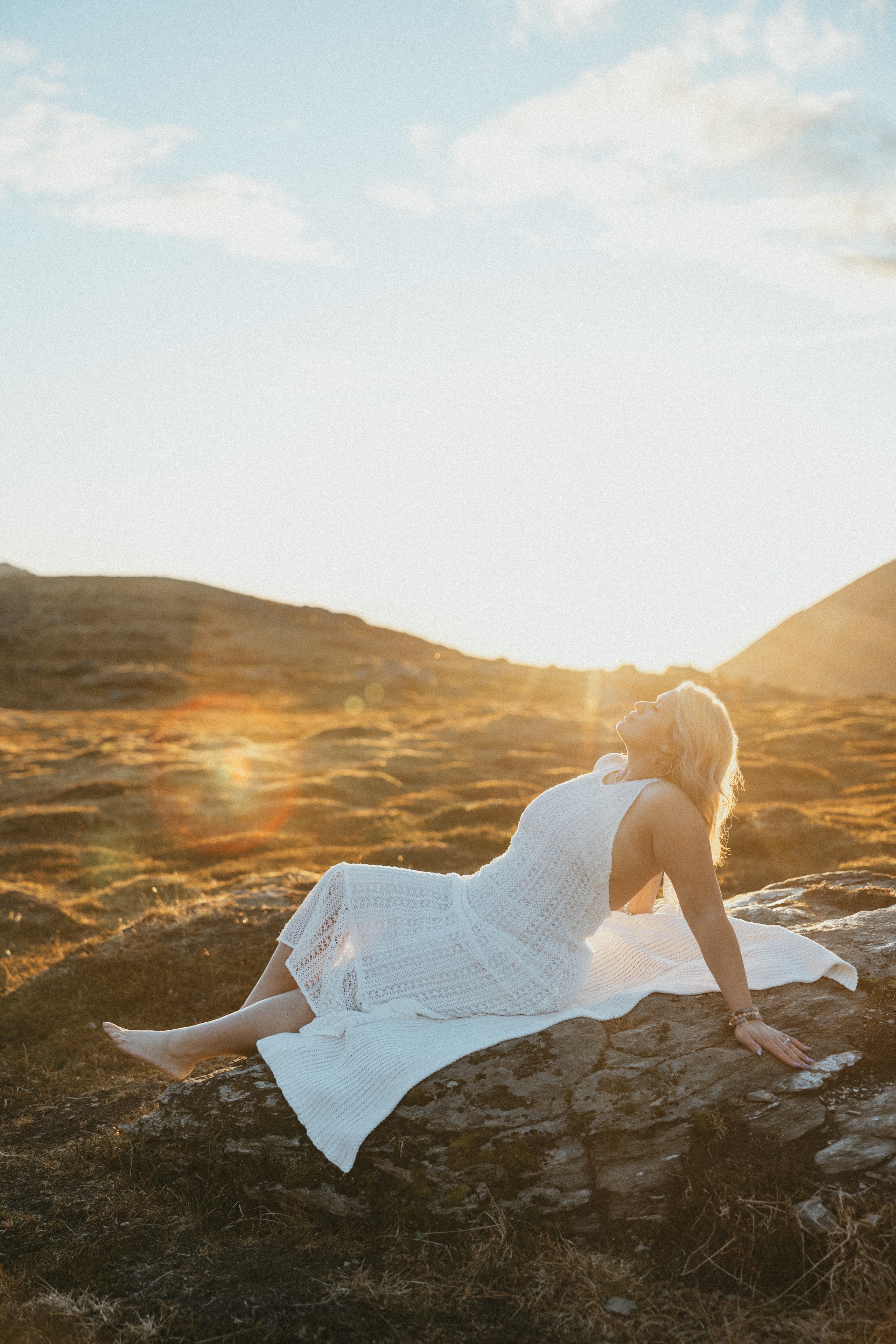 Brand photography by Lena Lee — woman in flowing dress at golden hour